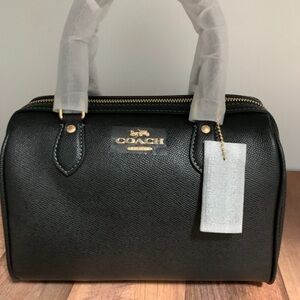 Luxury Coach Rowan black purse seems brand new